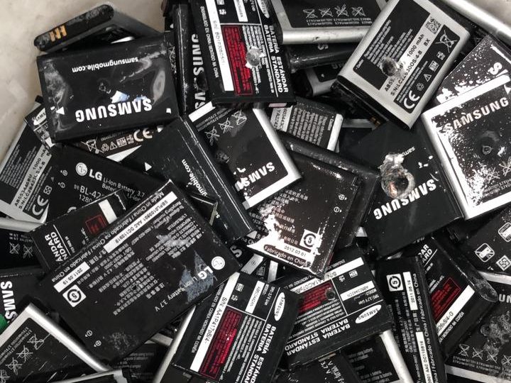 Lithium batteries from cell phones sorted for recycling
